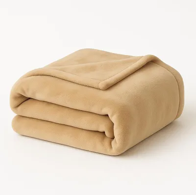 A folded beige blanket on a white background.