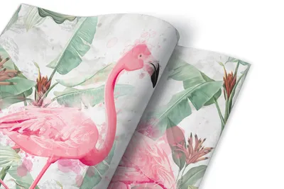 A close-up view of a roll of self-adhesive wallpaper featuring a tropical design with pink flamingos and lush green foliage.