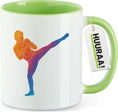 Produktbild von Huuraa Kaffeetasse Kickboxen bunte Silhouette 330ml Grün Keramik Kaffeebecher Geschenkidee