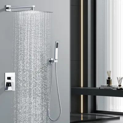 A modern bathroom with a chrome shower system in operation.