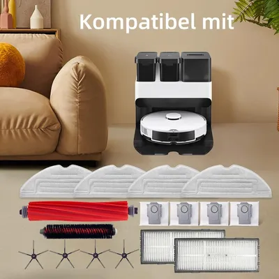 A collection of accessories for a robotic vacuum cleaner, including mop pads, a roller brush, side brushes, and filters, displayed in front of a couch and a robotic vacuum docking station.
