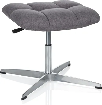 A gray tufted ottoman on a silver pedestal base.