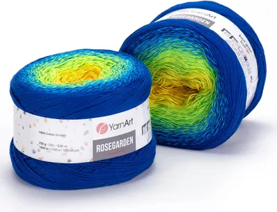 Two balls of yarn with a gradient color pattern.