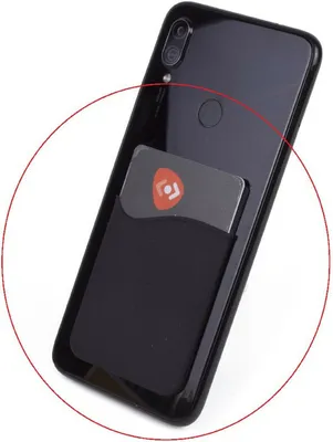 A black smartphone with a card holder attached to the back, holding a credit card.