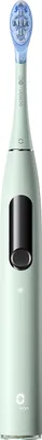 A product shot of an electric toothbrush.