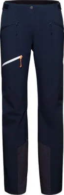 Dunkelblaue Softshellhose für Damen von Mammut mit seitlichen Reißverschlusstaschen und orangefarbenem Akzent.