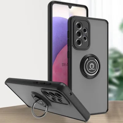 A phone case with a ring holder is displayed on a table.
