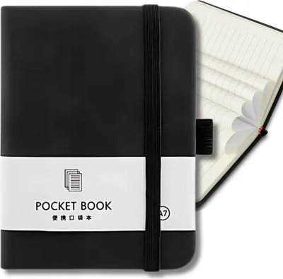 A black pocket notebook is shown with its pages fanned out.