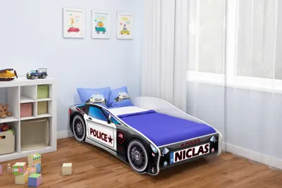 A child's bedroom with a car-shaped bed.