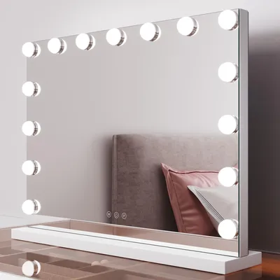 A makeup mirror with LED lights on a dresser.