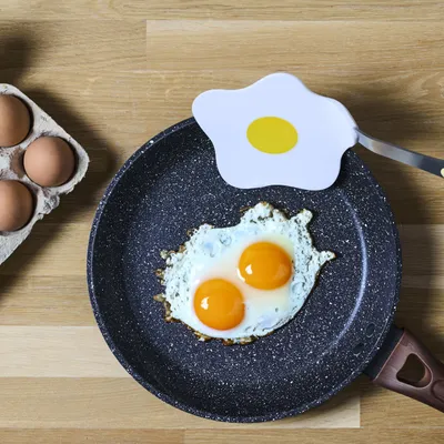 Image de Spatule En Forme D'oeuf Au Plat, Image générée par une IA