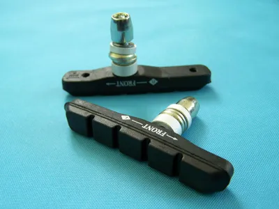 Produktbild von Geräuscharme Fahrrad OTC Bremsschuhe für V-Brake Felgenbremse 72mm Asymmetrisch