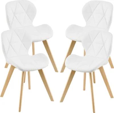 Four white dining chairs with wooden legs are arranged in a studio setting against a white background.