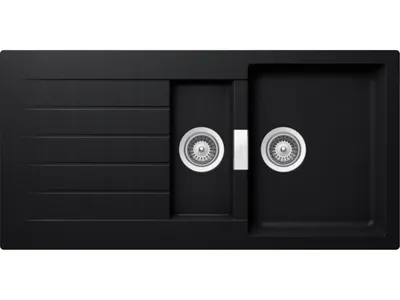 A black kitchen sink with two basins and a drainboard.