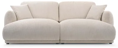 Kremowa sofa sztruksowa trzyosobowa z miękkimi siedziskami