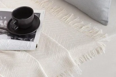 Imagen del producto de Manta decorativa Unyqoos® color crema con estampado de espiga, 100% algodón reciclado, 125 x 180 cm – ideal para cama y sofá, lavable a máquina a 30°C