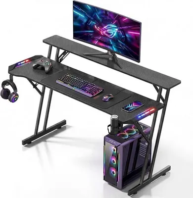 Produktbild von Gaming Tisch mit LED Beleuchtung, Monitorständer, PC Tisch 160 cm | Gaming Schreibtisch mit Getränkehalter, Kopfhörerhalter, Kohlefaseroberfläche, Computertisch für Streaming, Schwarz