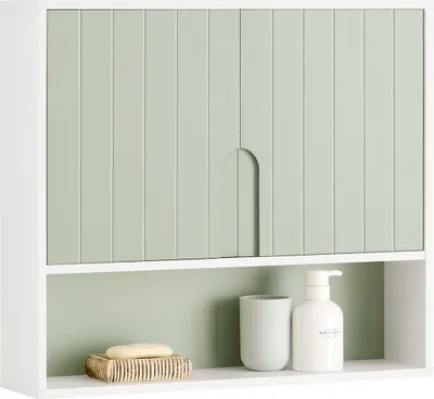 A white cabinet with light green doors and a shelf below, containing bathroom accessories.