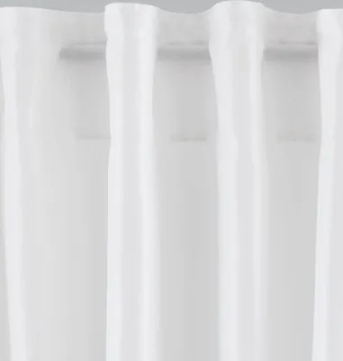 A close-up view of white curtains hanging on a rod.