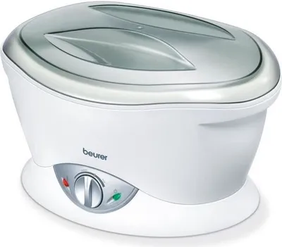 A white Beurer paraffin bath with a silver lid and control panel.
