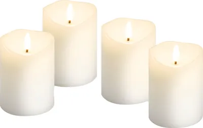 Four white LED candles with flickering flames are arranged on a white background.