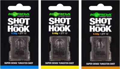 Three packages of Korda Shot on the Hook tungsten shot, each with a different weight and color-coded bottom.