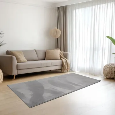 Produktbild von Teppich grau samtig weich Hasenfell-Optik mit sanftem Glanz Größe - 60 x 110 cm