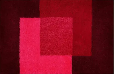 Produktbild von Spirella Badteppich Badvorleger Duschvorleger "Crossover" Hochflor waschbar, rutschfest Badematte 55x65 cm – Rot