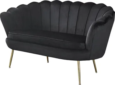 A black velvet sofa with gold-colored metal legs is shown against a white background.