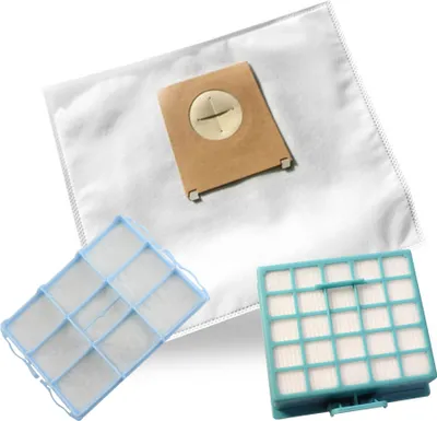 A collection of vacuum cleaner bags and filters arranged on a white background.