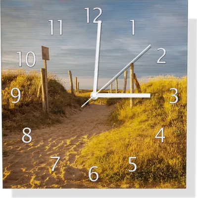 Produktbild von Wallario Design Wanduhr Düne am Strand bei Sonnenuntergang in Frankreich aus Aluverbund, Größe 30 x 30 cm