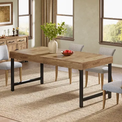 A dining room scene with a wooden table and chairs, set for a meal.