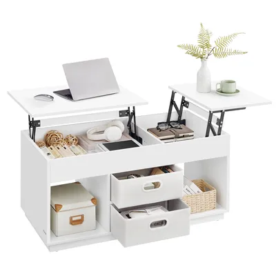 A white lift-top coffee table with storage compartments and drawers, displaying various items like a laptop, headphones, books, and decorative balls.