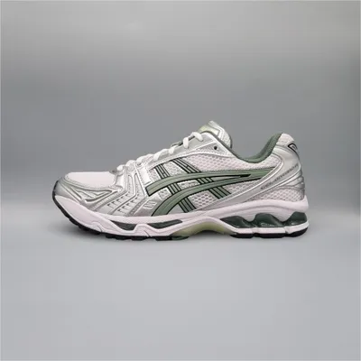 A single ASICS Gel-Kayano 14 shoe is shown from the side against a plain gray background.