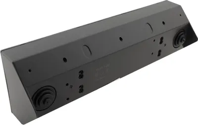 The underside of a black power strip with multiple outlets and USB ports, shown at an angle against a white background.