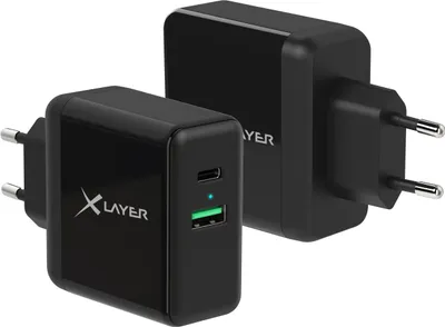 Two black USB chargers are shown against a white background. One charger is in the foreground and slightly angled, while the other is in the background and also angled.