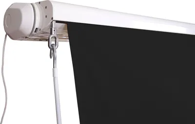 Close-up of an awning mechanism with a black fabric partially unrolled.