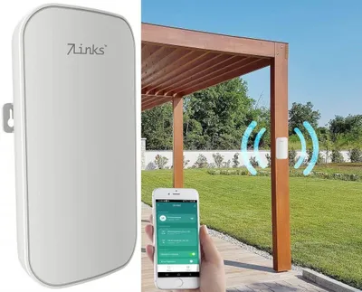 A smart home device is shown mounted on a wooden post in a garden, with a smartphone in hand showing the device's interface.