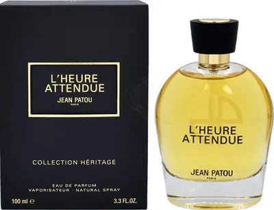 A perfume bottle and its box are displayed side-by-side against a white background.