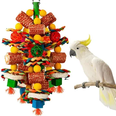 Image de Jouet pour perroquets en forme de maïs, en loofah coloré, idéal pour mâcher. Fabriqué à partir de matériaux naturels