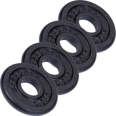 A set of four black weight plates arranged diagonally on a white background.