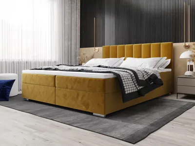 A bedroom scene with a bed as the main focus.
