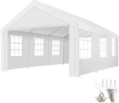 A white party tent with arched windows, shown from a diagonal angle.