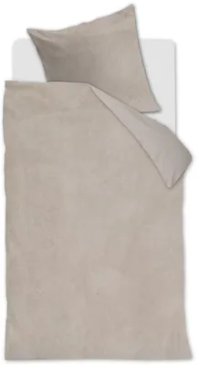 A duvet cover and pillowcase are laid out on a white surface.