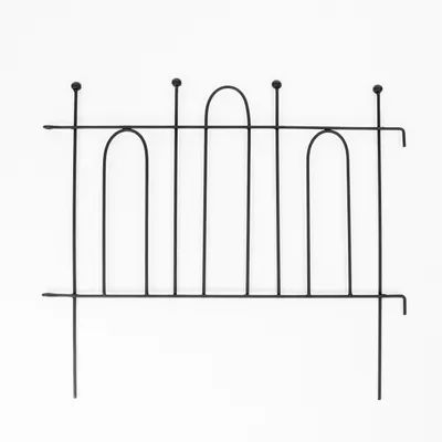 A black metal garden border fence on a white background.