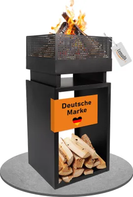 A black metal fire pit with a storage compartment for firewood, displayed on a gray circular base.