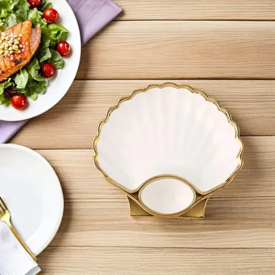 Produktbild von Keramikteller in Muscheloptik mit Gewürzschale, Servierplatte für Hühnchen und Teller für Vorspeisen
