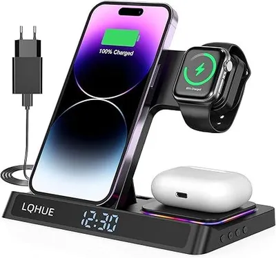 A black 4-in-1 wireless charging station with a phone, smartwatch, and earbuds case charging.