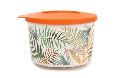 A round food storage container with a tropical leaf pattern and an orange lid, presented on a white background.