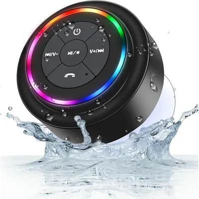 A black portable Bluetooth speaker with LED lights is shown splashing in water.